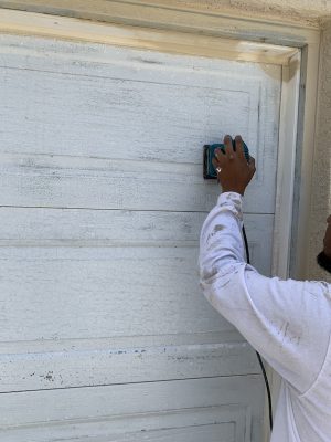 Stripping Garage Door to Aluminum